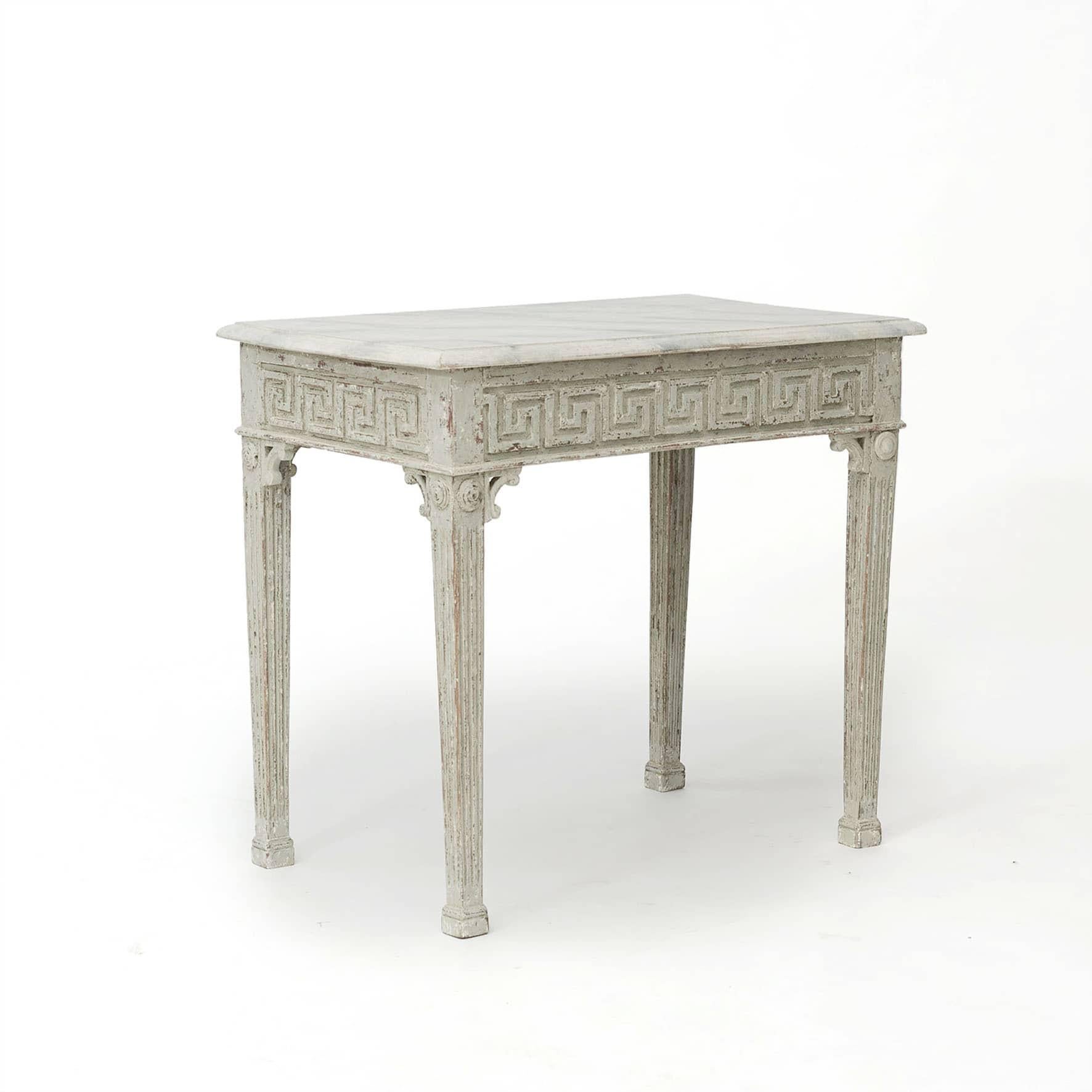 Elegant Louis XVI console table.
Light gray marbled table top with profiled edge.
Apron with carved 'á la grecque' on all four sides. Tapered legs with flutes finished.
Copenhagen, 1780-1790.
Professional restored.