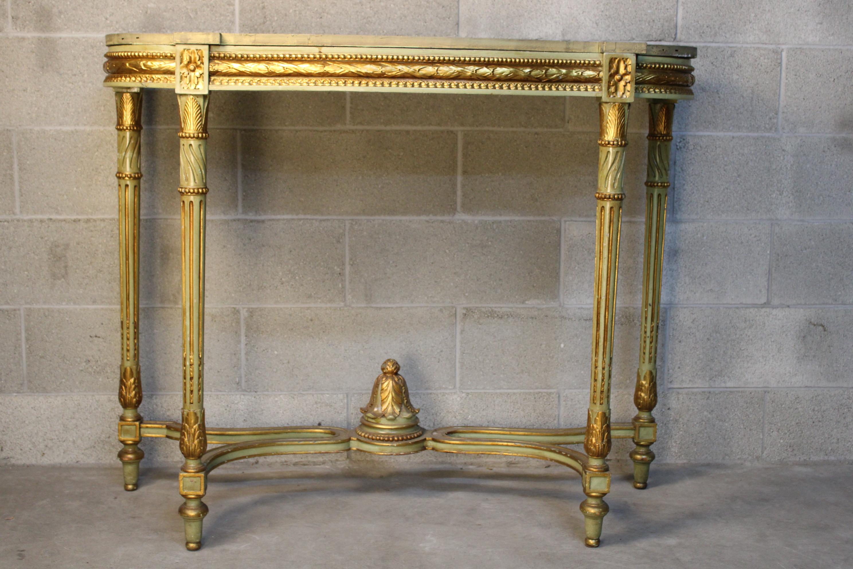 Louis XVI console table gilded and Carved circa 1870 Italy 
gilded and carved wood in good condition. Beautiful piece.
storage and container shipping is available