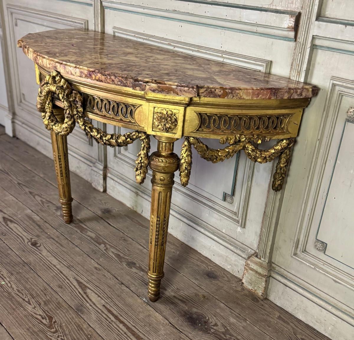 French Louis XVI console table in carved and gilded wood with brocatelle marble from For Sale