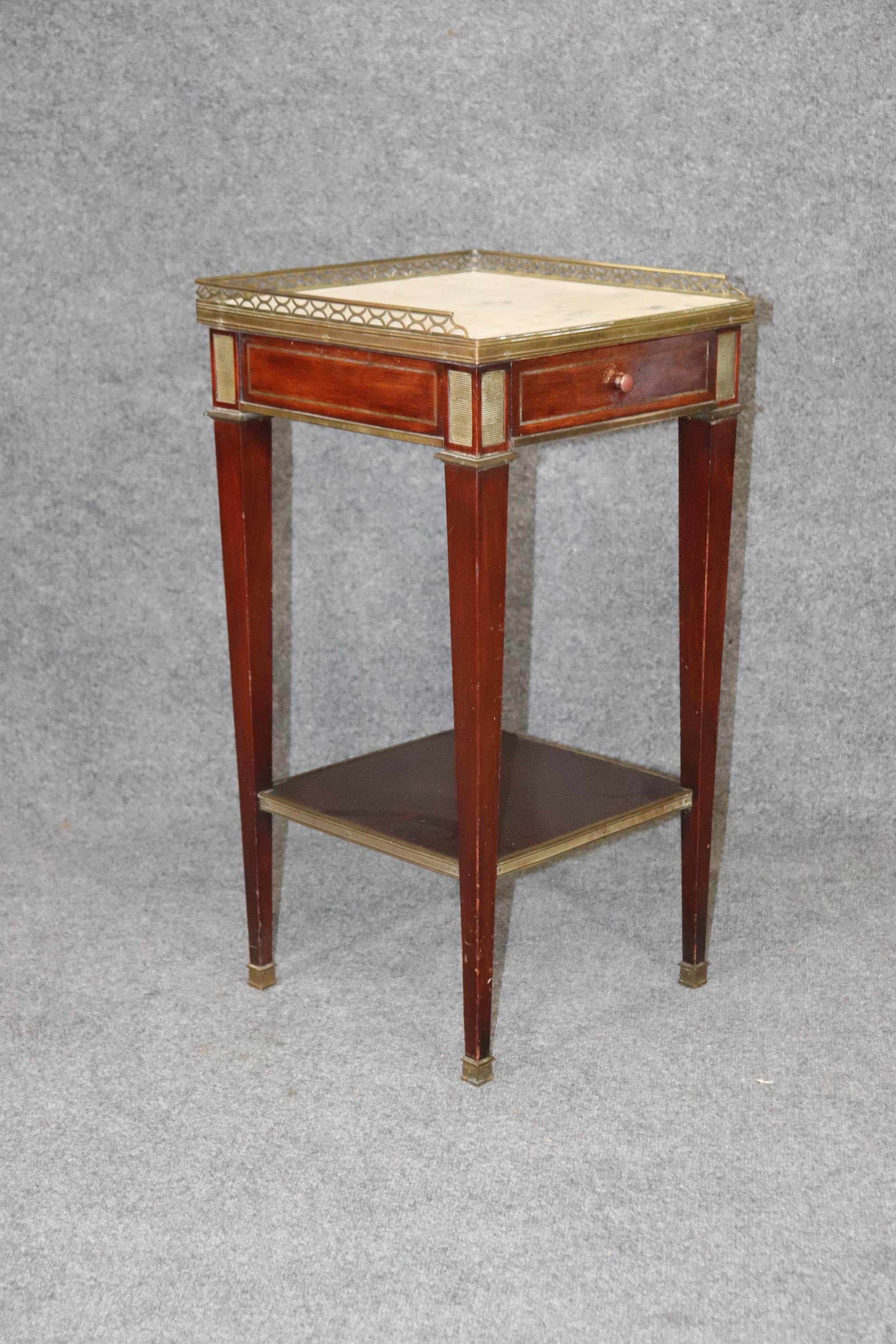 This Louis XVI Style French Marble Top Stand is made of the highest quality and is truly remarkable! Although small this little stand/end table packs a punch! and will most definitely be a conversation starter! This stand can be paired with just