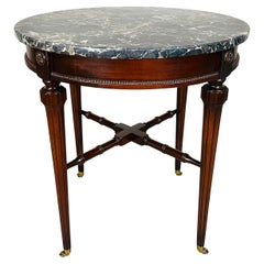 Table à Gueridon en acajou sculpté et marbre Portoro de style Louis XVI Directoire