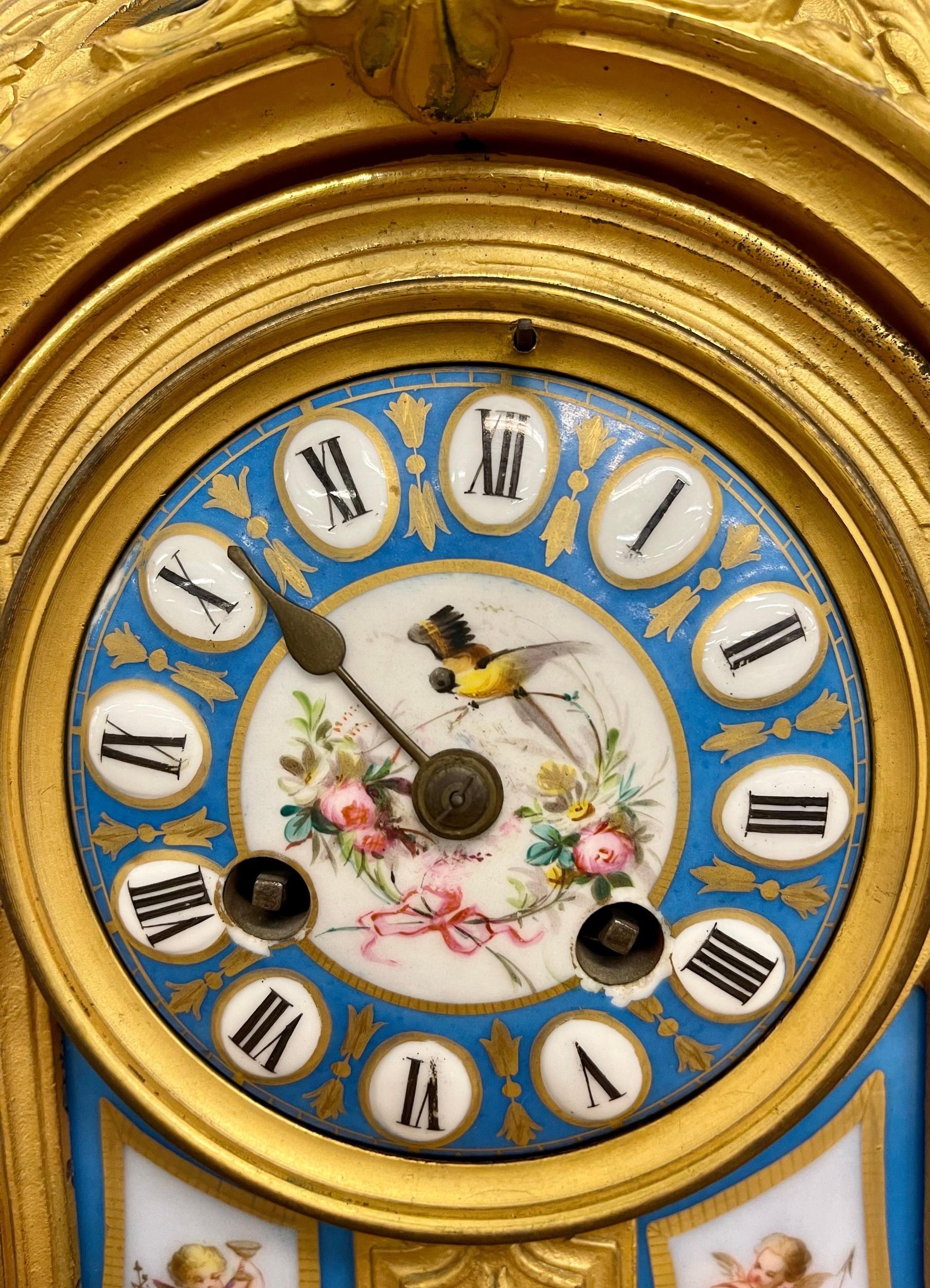 Louis XVI Dore bronze mantle clock, Conrad Felsing, Berlin. A finely cast dore' bronze mantle clock with Sevres porcelain face and decorative plaques. A fine example of the Belle Époque era. Not in working order, missing key, minute hand and