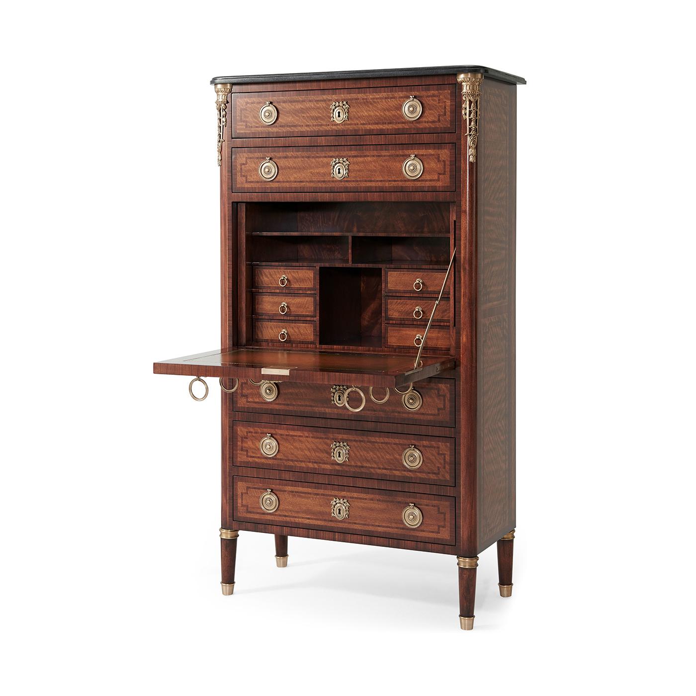 Crafted from mahogany and morado, and delicately line-strung for contrast, this secrétaire à abattant, disguised as a Semanier dresser, is a masterful expression of late 18th-century French design. The stone top is set above brass-mounted columns