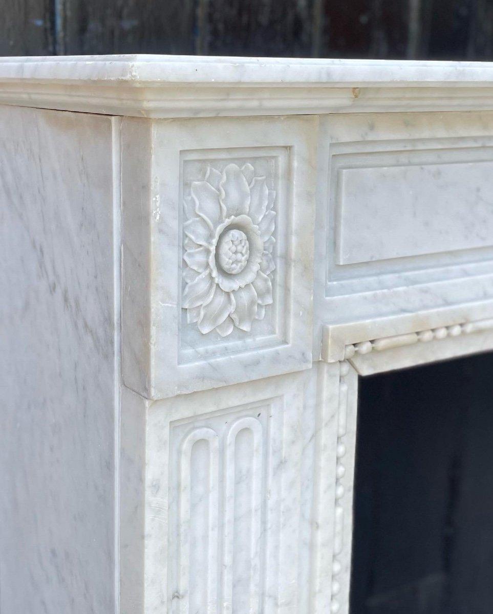 Carrara marble fireplace, early 19th century fireplace dimensions: 96 x 141cm.