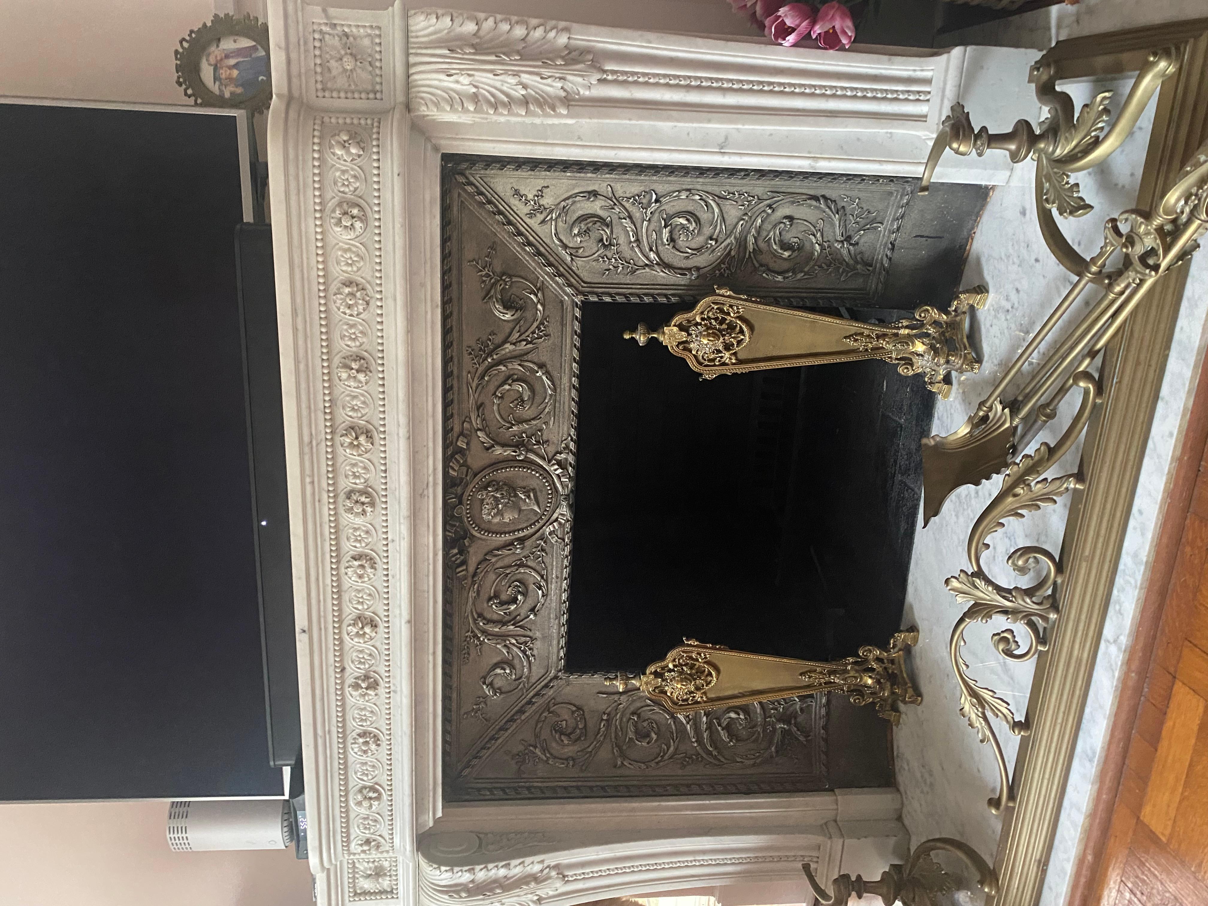 Superbly carved Louis XVI Fireplace in Carrara Marble with Cast Iron panels
Overall dimensions: 63