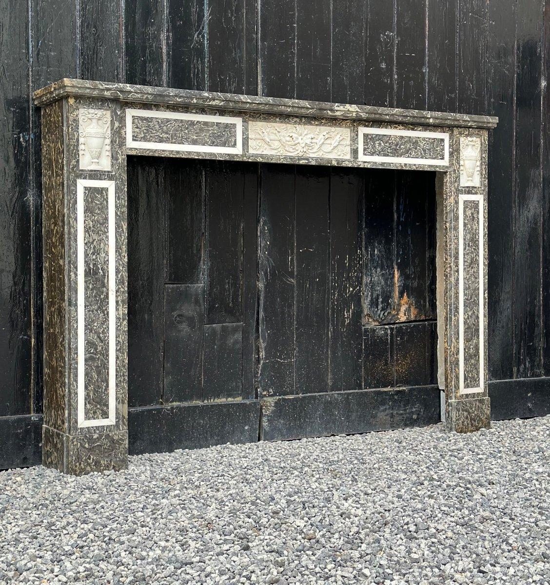Louis XVI fireplace mantel, in Sainte-Anne gray marble and statuary white. Fireplace dimensions: 91 x 119 cm