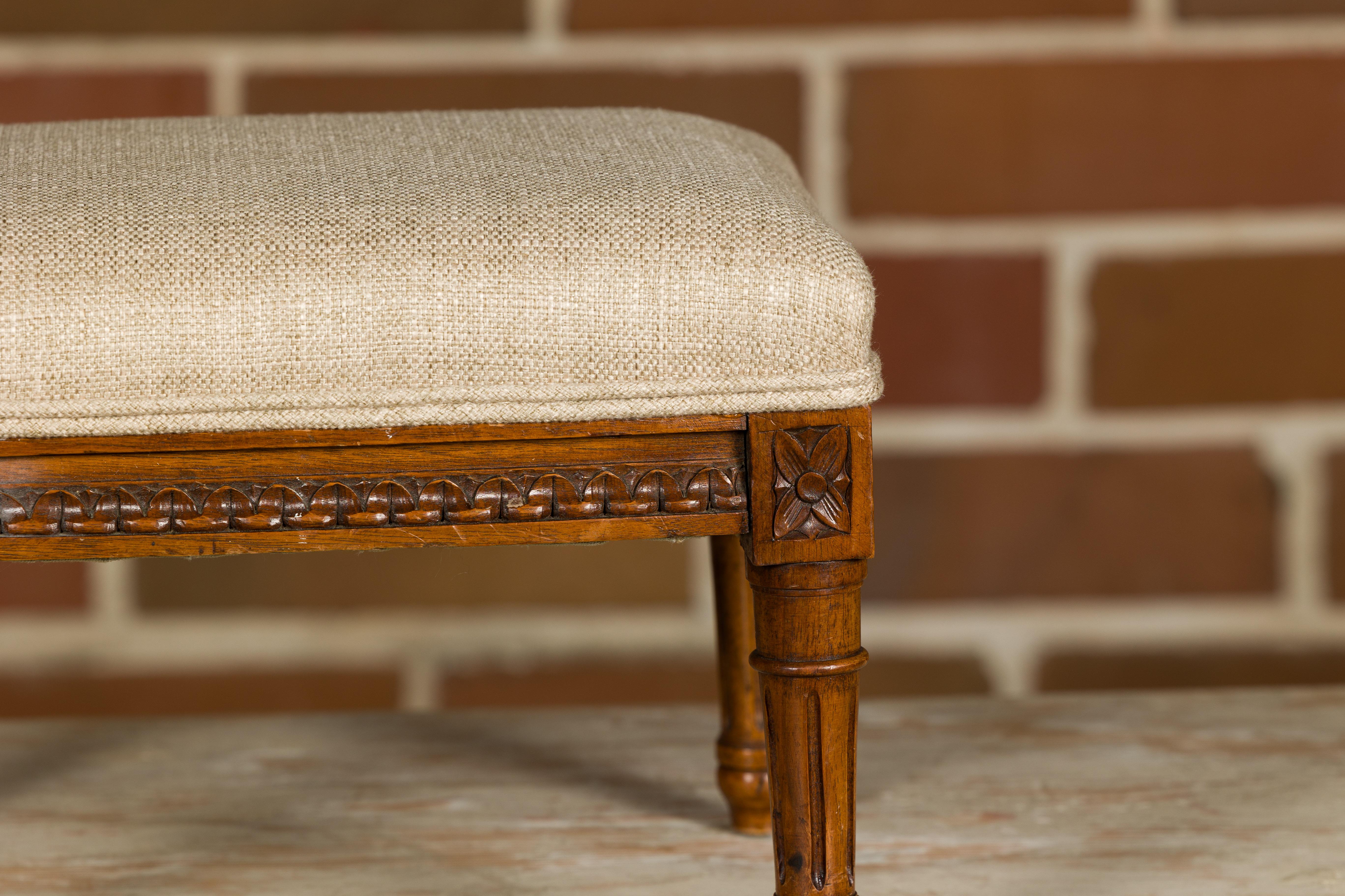 Upholstery Louis XVI French 1900s Footstool with Carved Rais de Cœurs and Rosettes For Sale