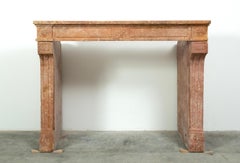 Louis XVI French Fireplace in Rare Rose Limestone