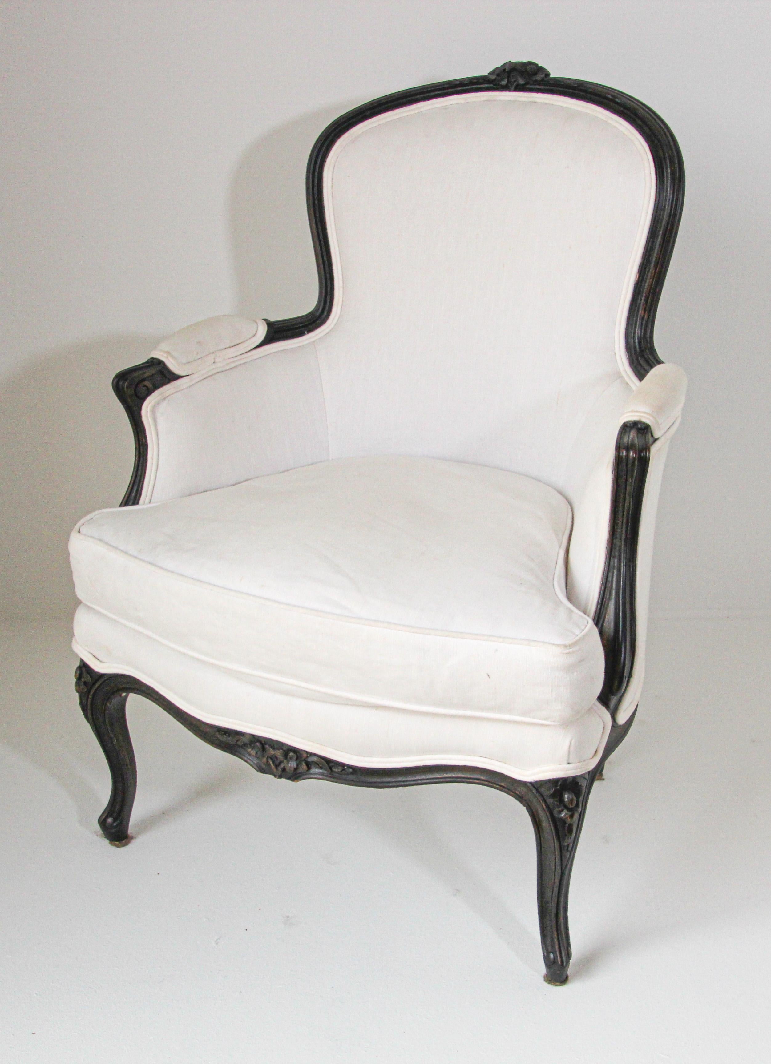 French black painted Louis XVI style bergère armchair.
Louis XV French Provincial 