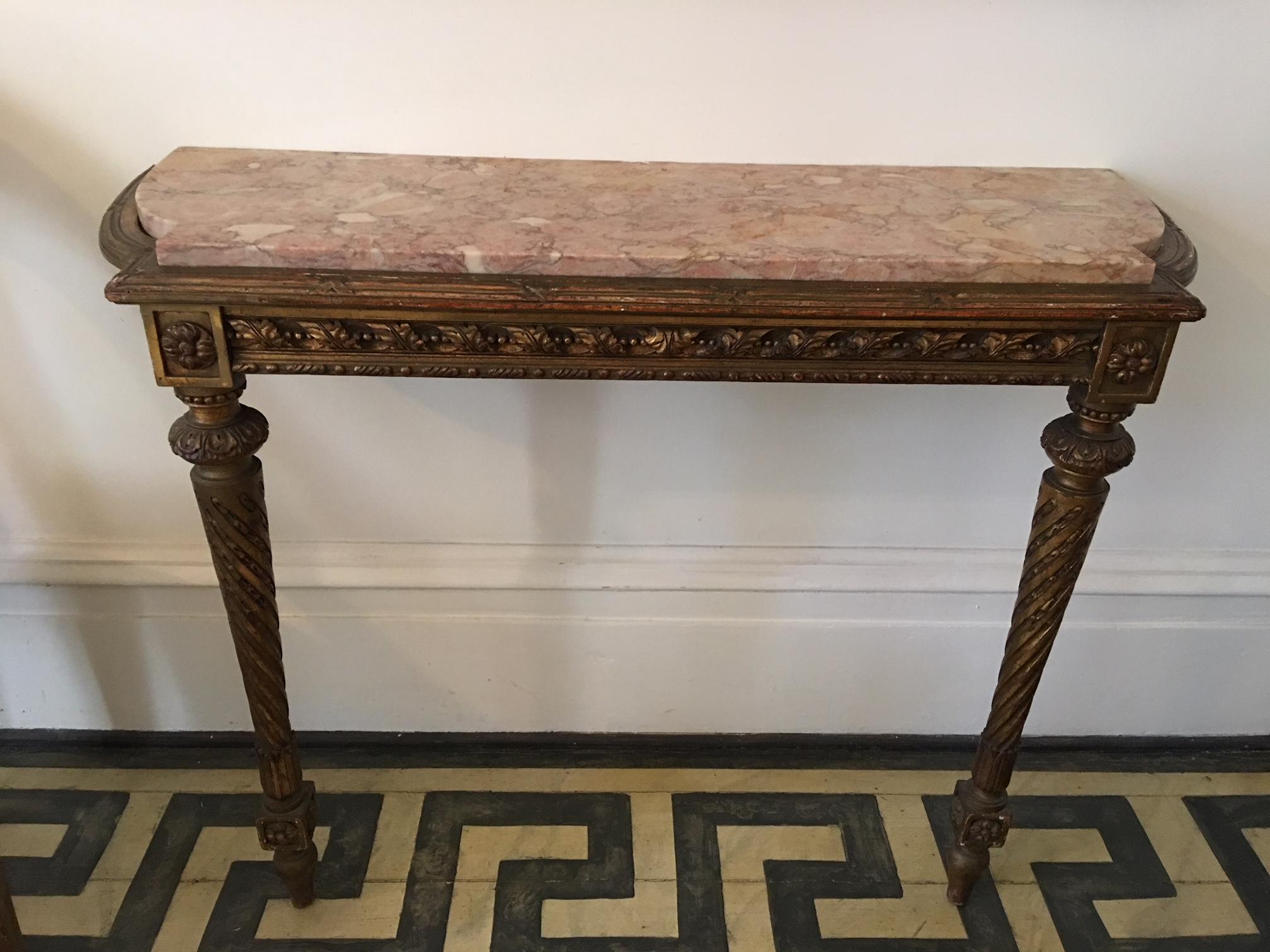Louis XVI gilded console with a marble top, 19th century.
