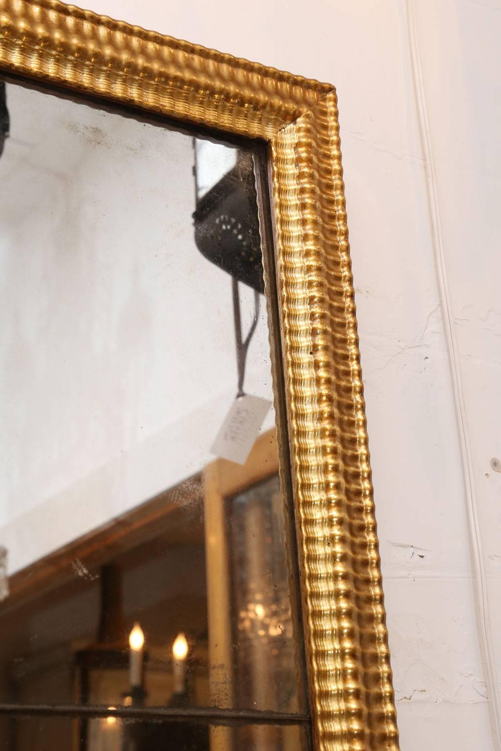 XVIIIe siècle Miroir Louis XVI en bois doré en vente