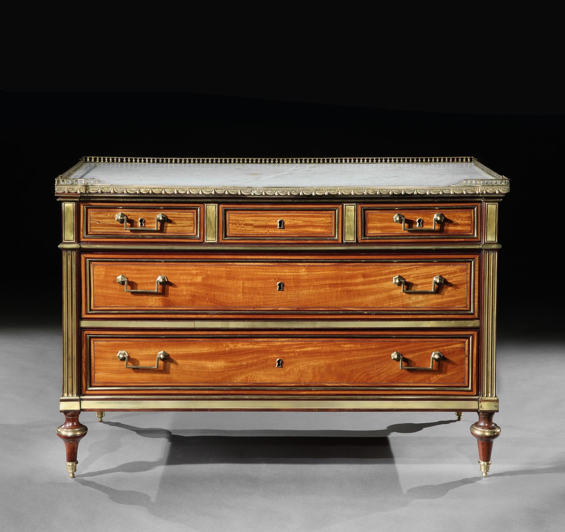 A rare and important Louis XVI gilt bronze-mounted bois citronnier and amaranth marble topped commode firmly attributed to Claude-Charles Saunier (1735-1807), maître in 1752.

French, Paris circa 1785.

Of elegant Neo-Classical design, this