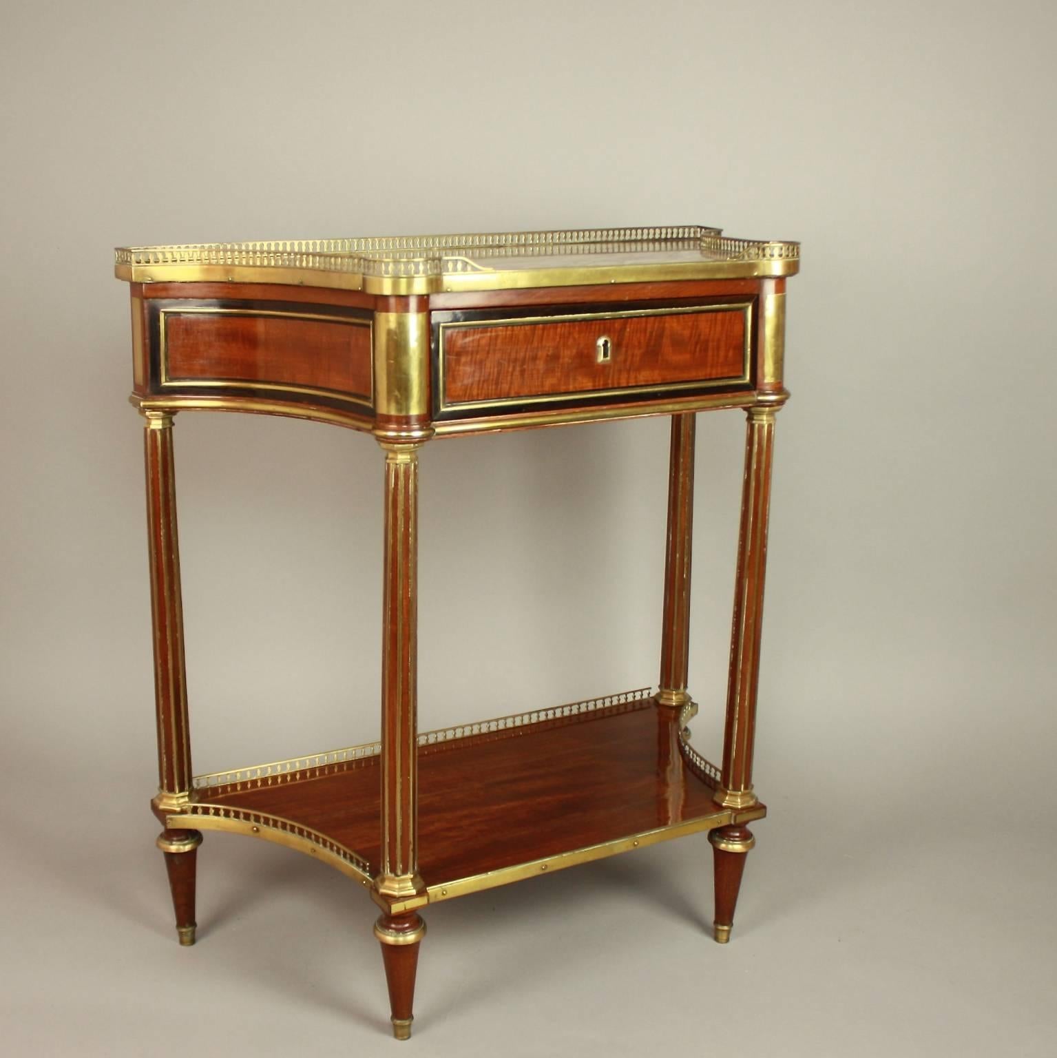 A fine Louis XVI gilt-bronze mounted satinwood and mahogany console table in the manner of Claude-Charles Saunier (1735-1807). 
The console table with a concave-sided rectangular top with an inset red and white marble top 'Sarrancolin Ope´ra' with