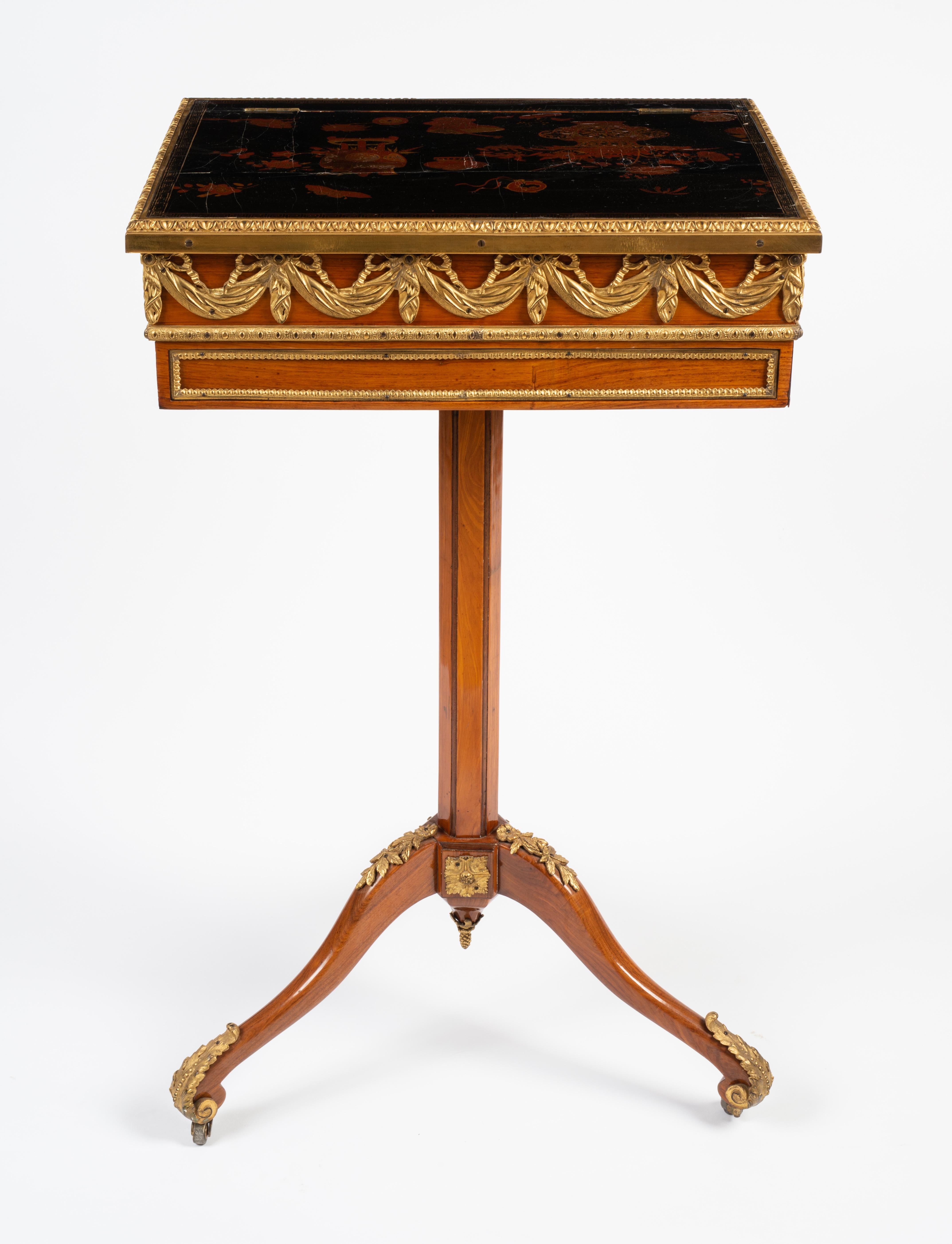 With later embellishments, the rectangular ratcheted and adjustable raisable top with book stop and lacquered top depicting vessels and plants, the ratchet with fold-out book stop, above the frieze with two opposing drawers, one fitted drawer with