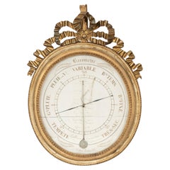 Barómetro Luis XVI de madera dorada
