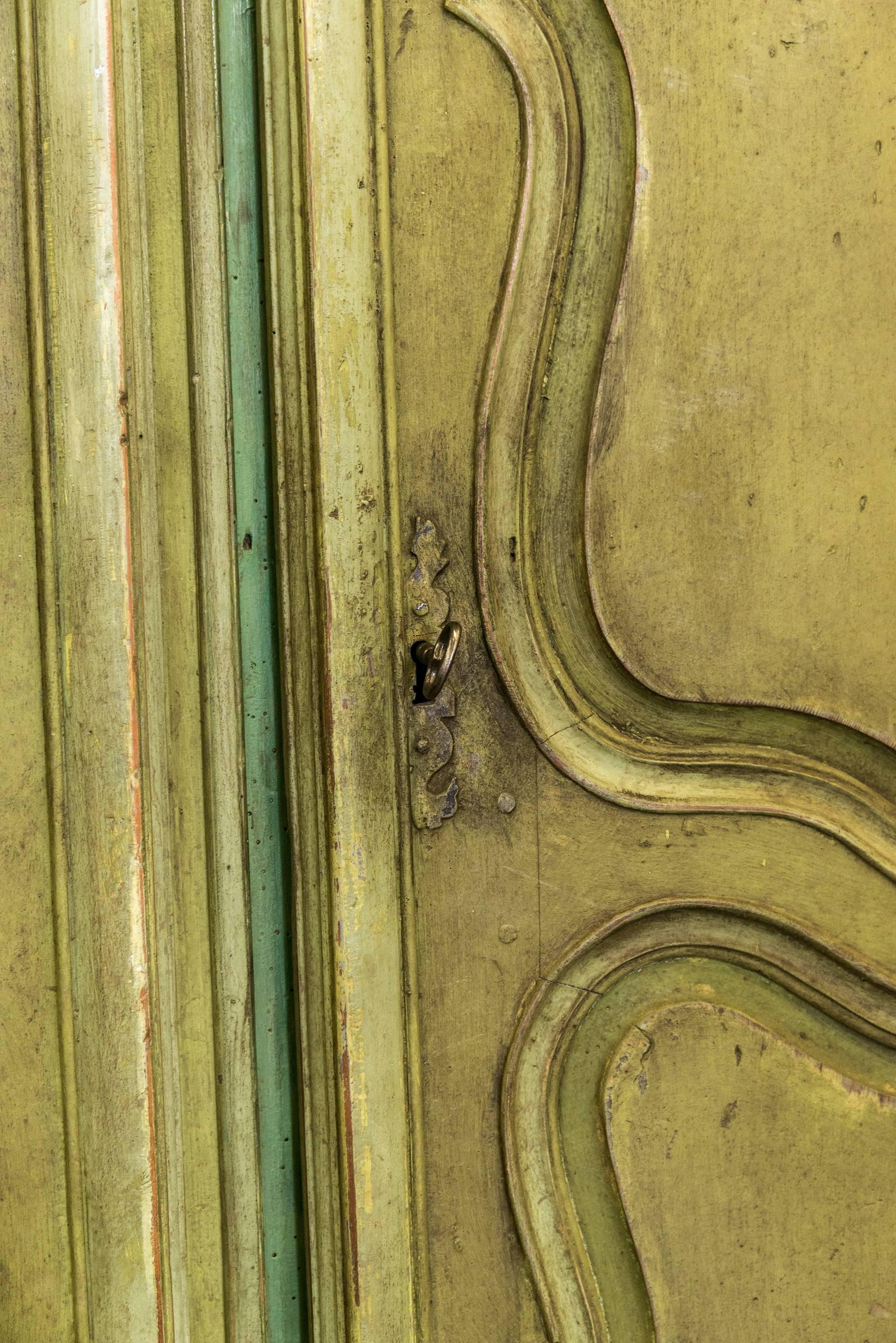 A beautifully painted grey, Louis XVI armoire from either times Provence or Auvergne, French, late 18th century.