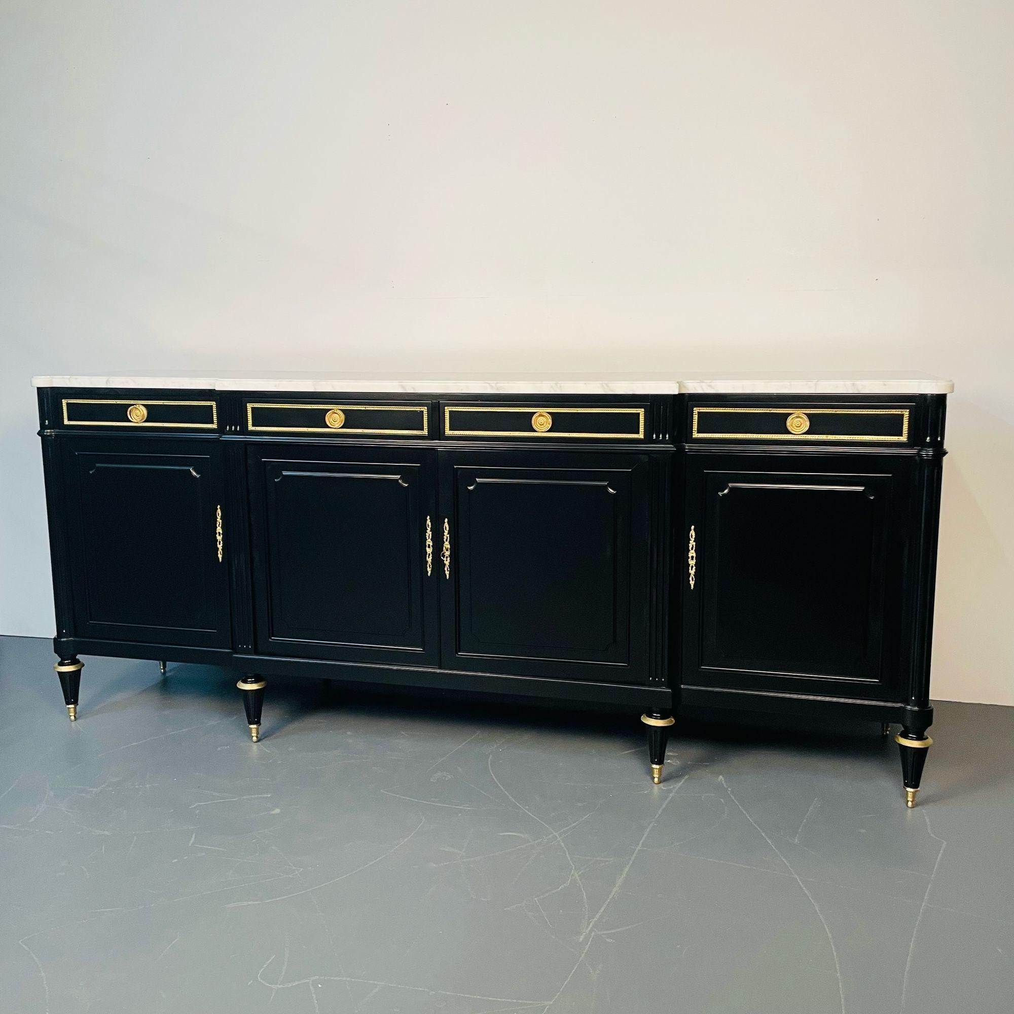 French Louis XVI Hollywood Regency Style Ebony sideboard, cabinet, Maison Jansen
 
This large and impressive recently refinished ebonized wood Maison Jansen style bronze mounted cabinet or sideboard is absolutely flawless. Having four doors in
