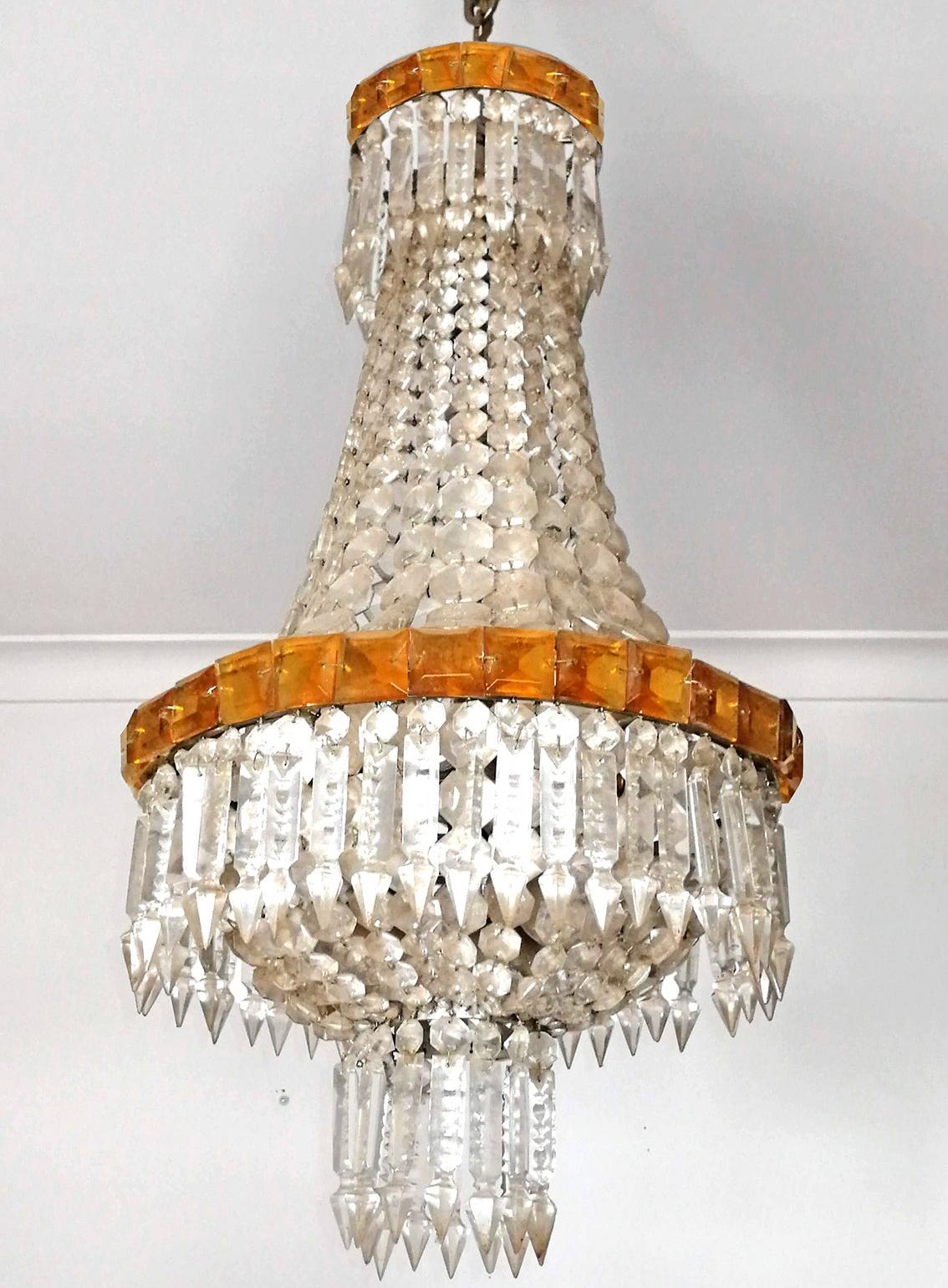 8-light French Empire amber crystal basket chandelier and chrome frame.
Measures:
Diameter 14.17 in/ 36 cm
Height 33.85 in( 2 in chain) / 86 cm (5 cm chain)
Weight: 26.5 lb/ 12 Kg
8 light bulbs E14, good working condition
Assembly required. Bulbs