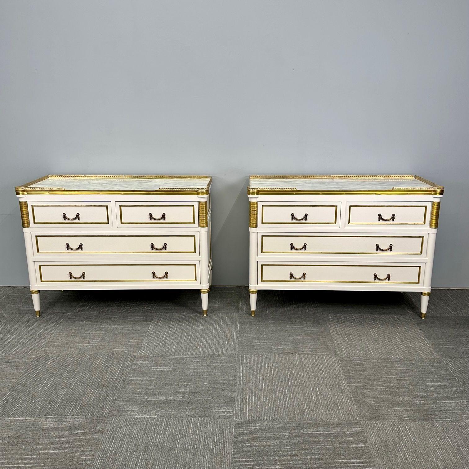 Louis XVI Hollywood Regency Maison Jansen Style White Commodes / Nightstands or Chests
 
Stunning pair of Marble Top Hollywood Regency Style Commodes or Chests. Each having two drawers over two larger drawers under a pierced bronze galleried framed