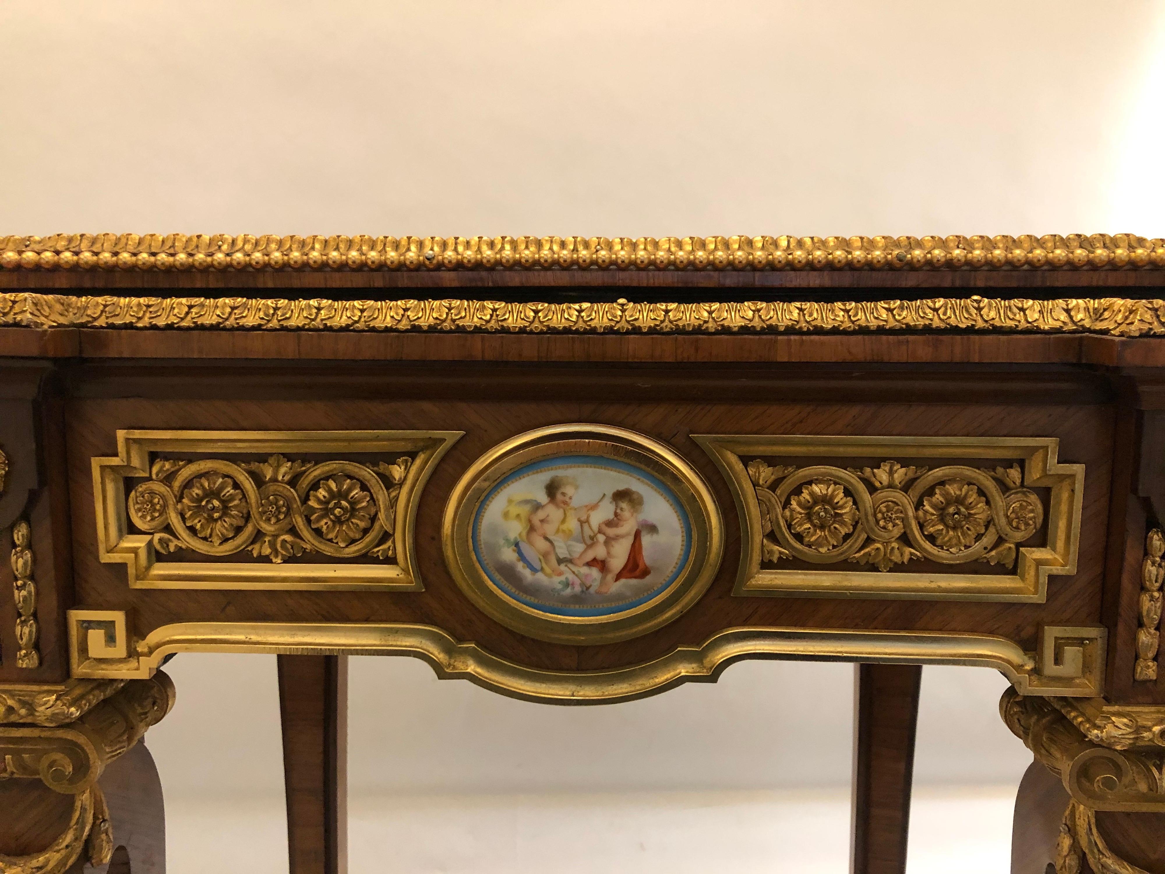 19th century French, King Louis XVI wood jardinière. Hand painted porcelain plaque with five ormolu mounts, in the manner of Henry Dasson.