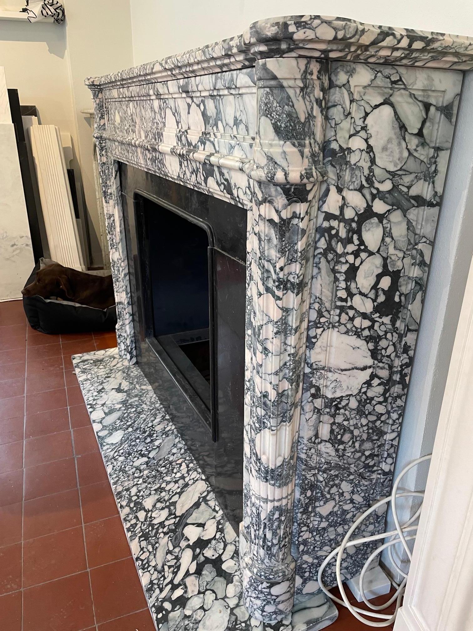 fluted marble fireplace