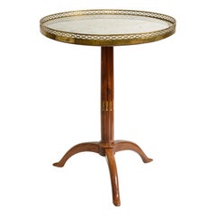 Fidelis Schey, Gueridón de la galería Luis XVI de mármol y latón del siglo XVIII, estampado