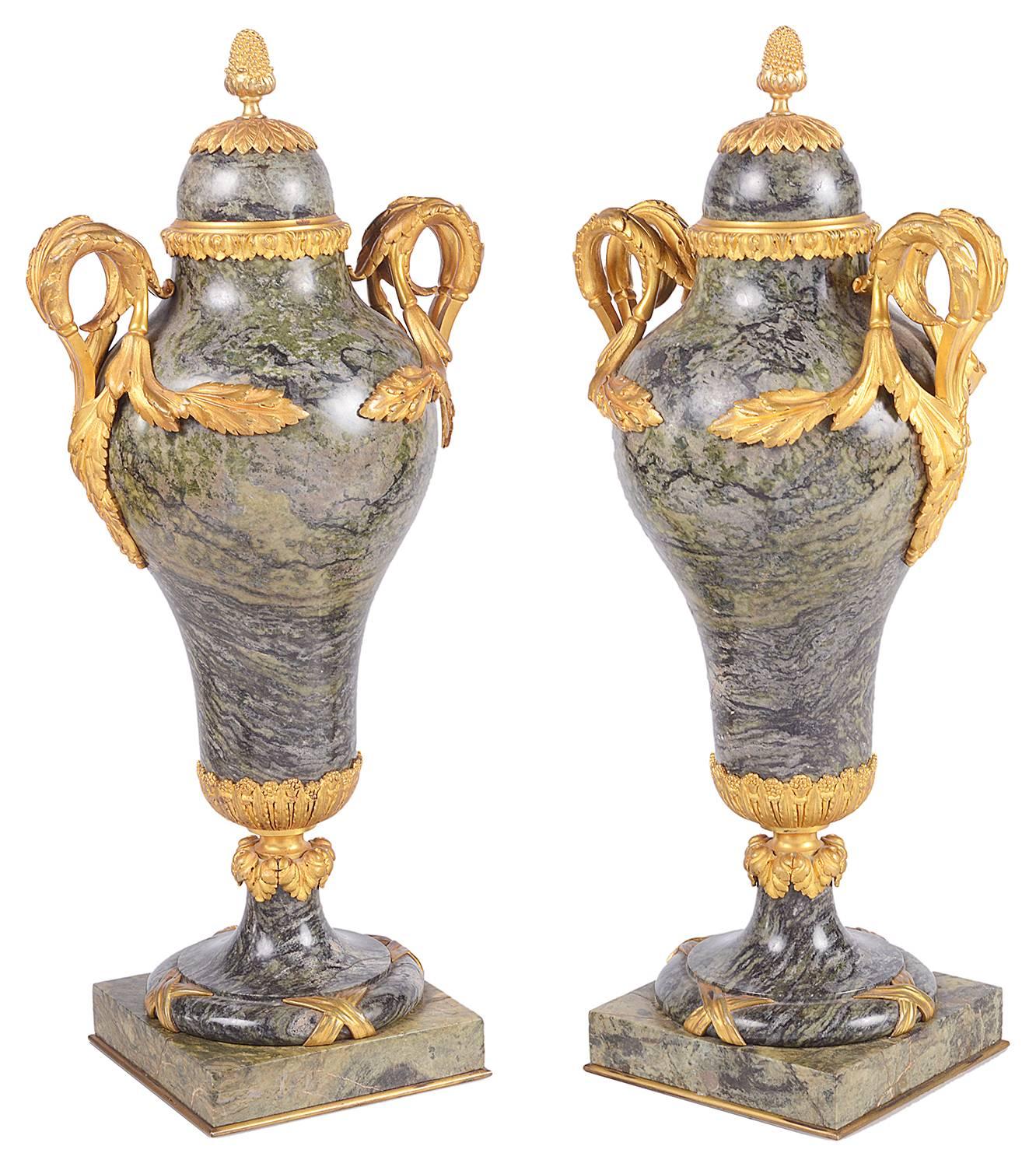 A good quality pair of French Marble and gilded ormolu lidded urns, circa 1880.