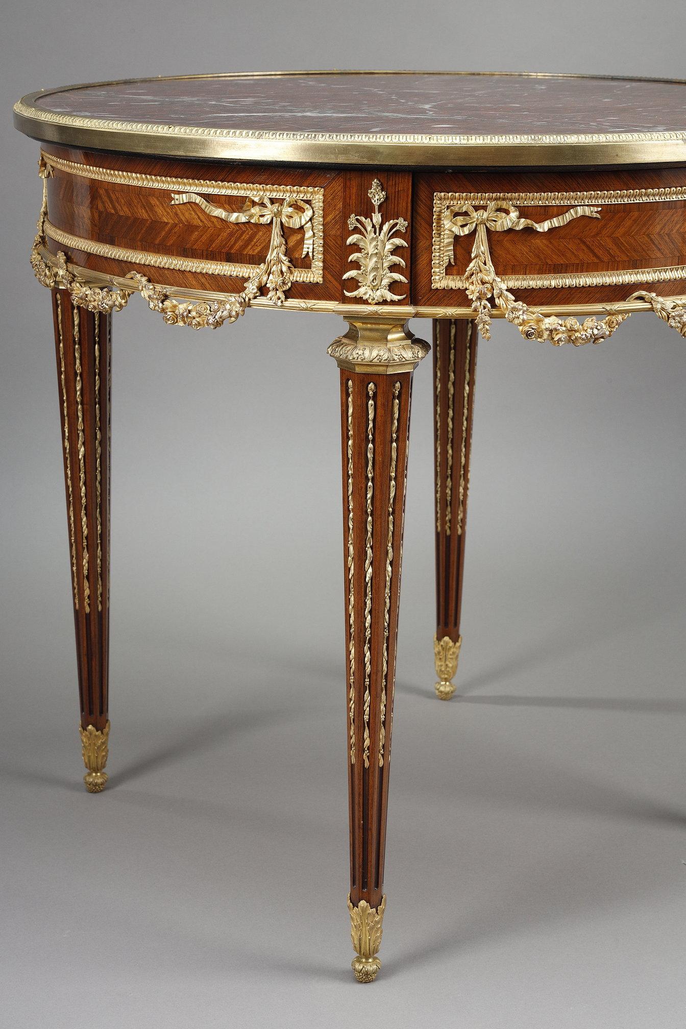 Louis XVI marquetry and gilt bronze pedestal table with marble top In Good Condition For Sale In Paris, FR