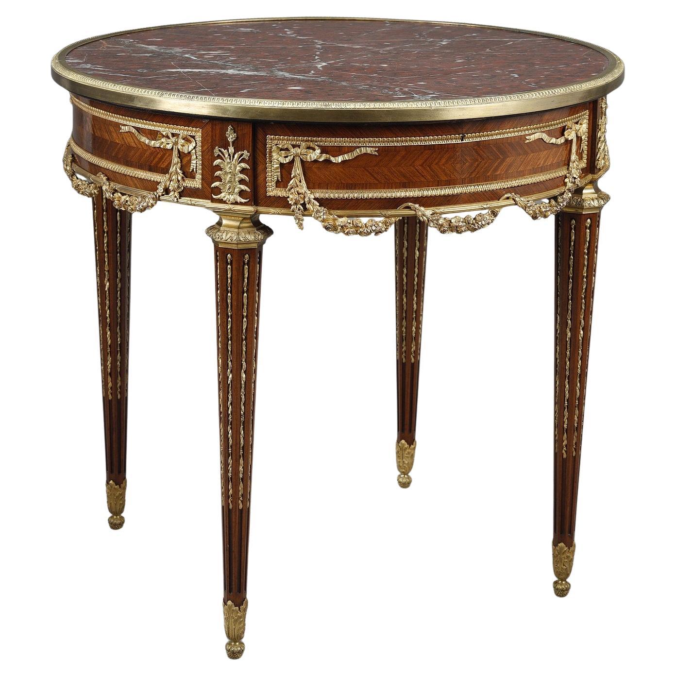 Louis XVI marquetry and gilt bronze pedestal table with marble top