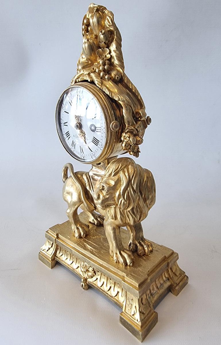 French Louis XVI Miniature Ormolu  Mantle Clock of a Lion by Philippe Pajot For Sale