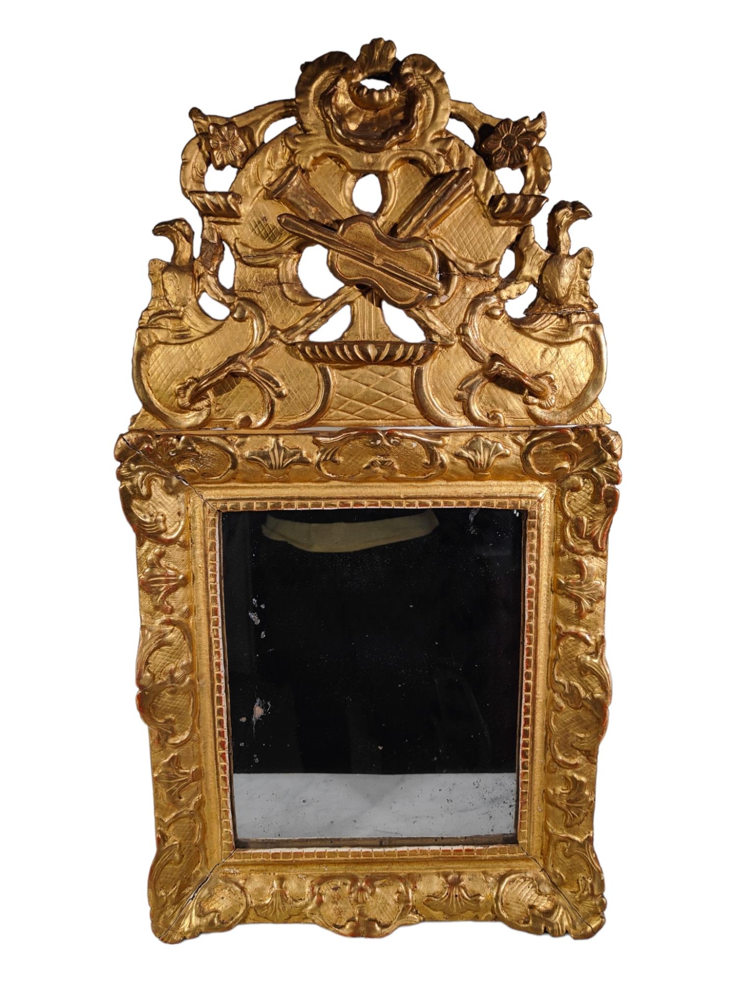 Louis XVI mirror and gilt wood.
France, end of XVIII CENTURY. Good condition. Size:74x40 cm