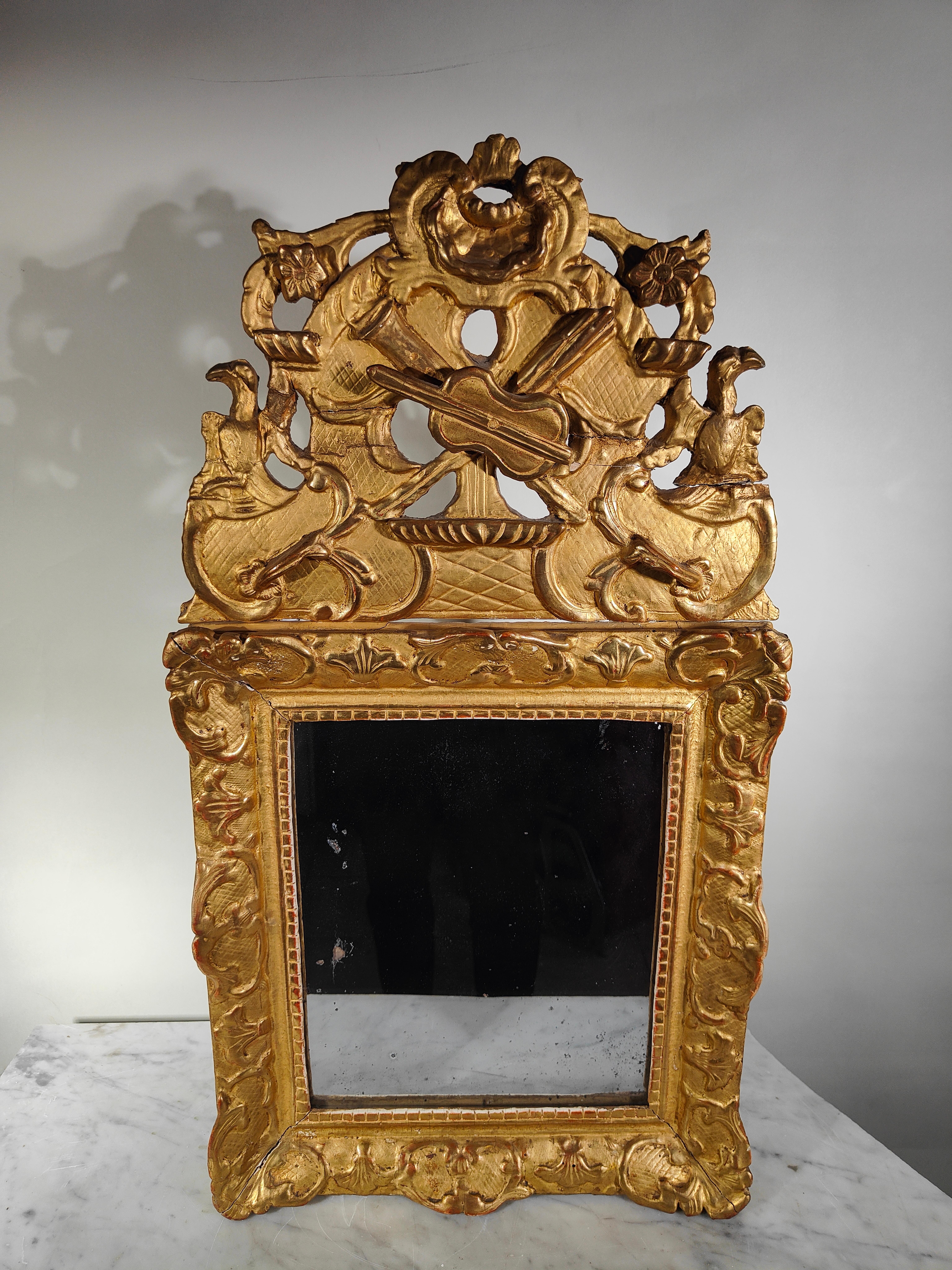 Miroir Louis XVI et bois doré. 1