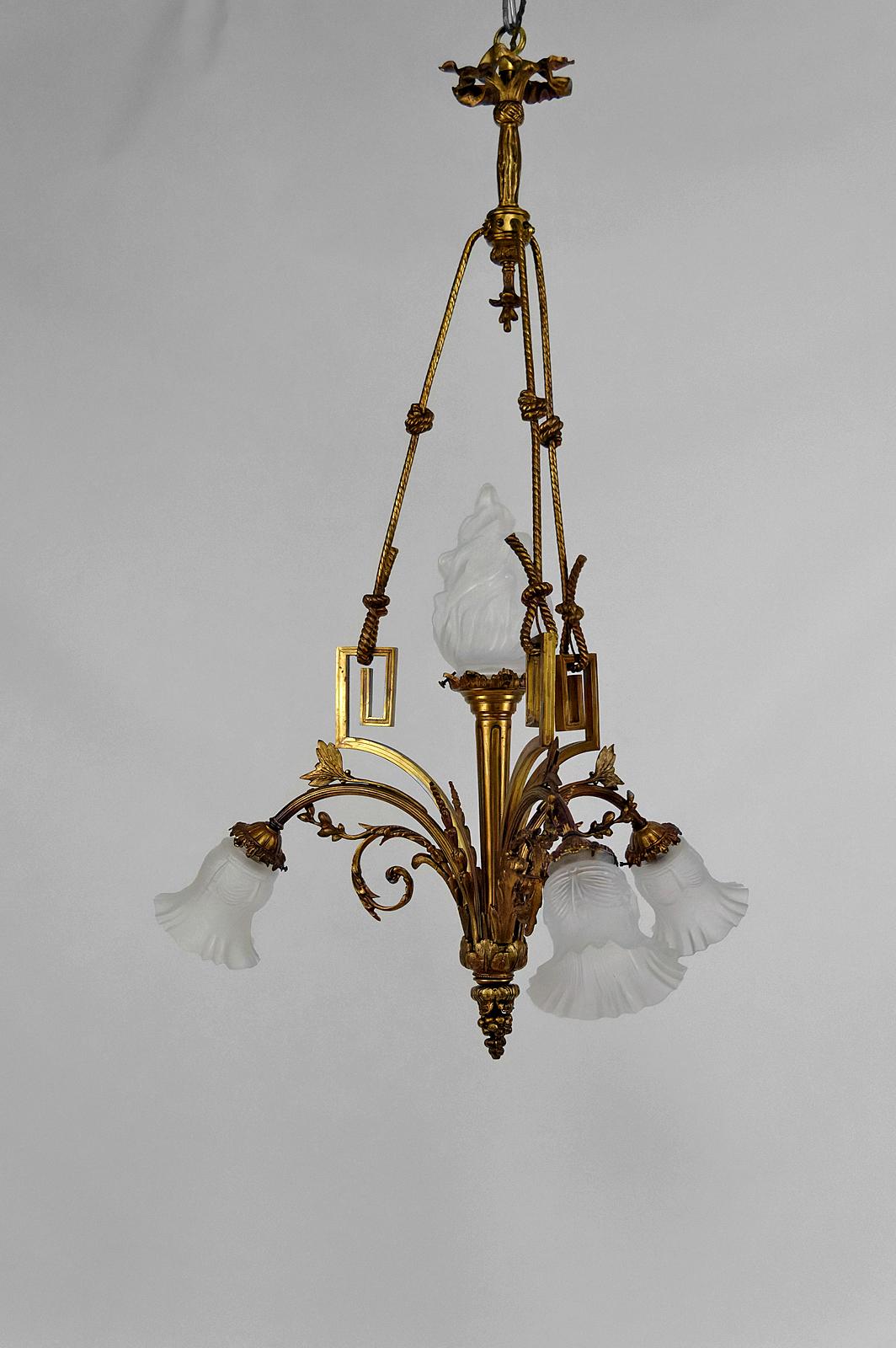 French Louis XVI / Neoclassical style chandelier in gilded bronze, France, Circa 1900 For Sale