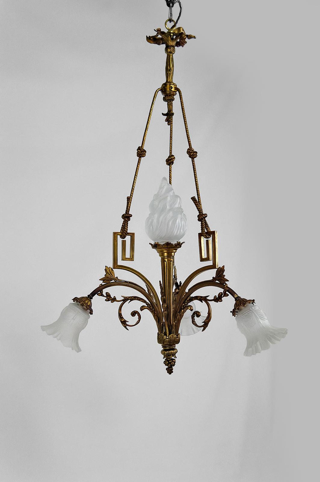 Gilt Louis XVI / Neoclassical style chandelier in gilded bronze, France, Circa 1900 For Sale
