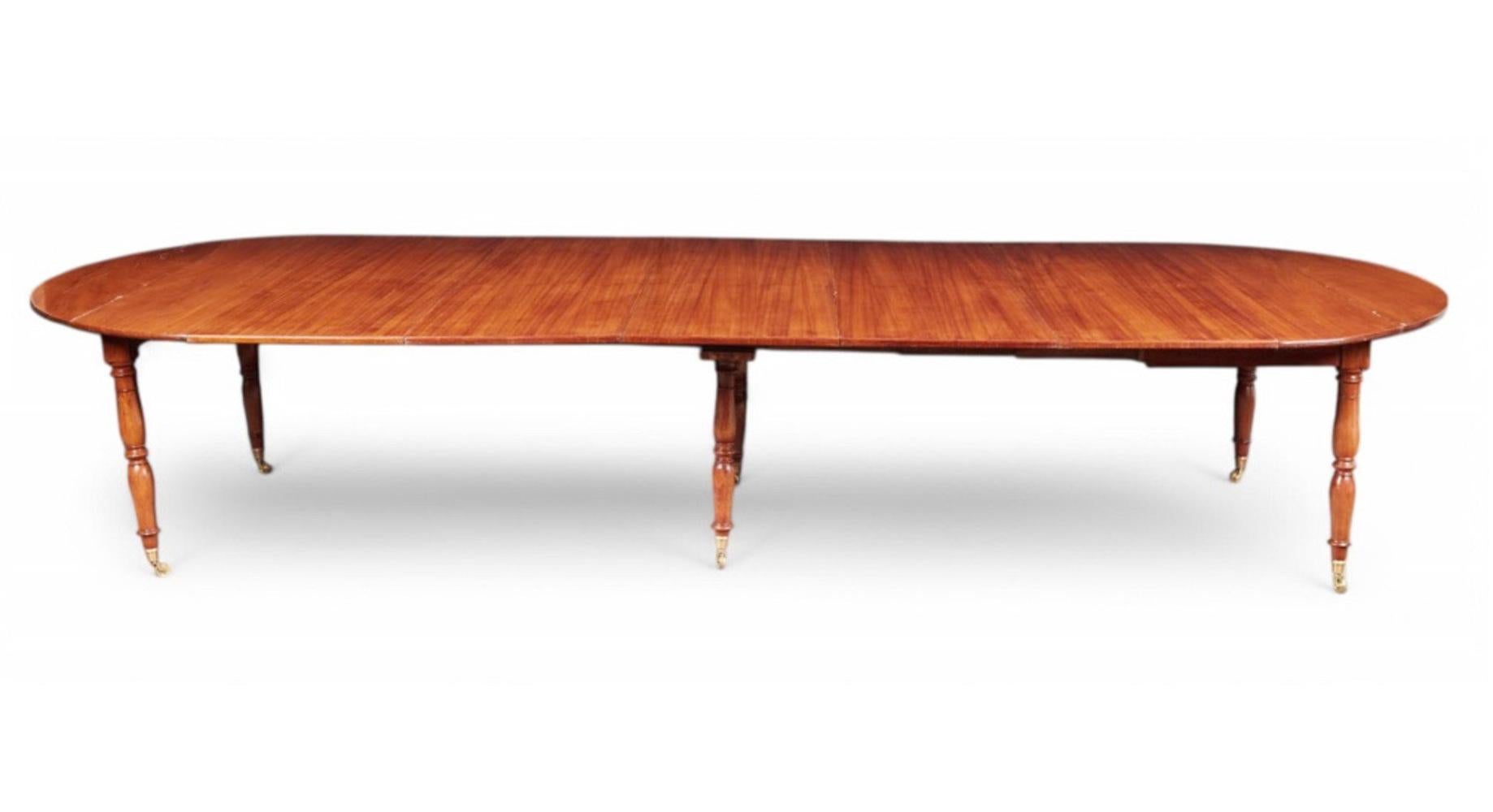 This is an exceptional late 18th/early 19th century French mahogany extending dining table. The beauty and rarity of this table make it a stand out choice for any dining room. It can be enhanced with either traditional Louis XVI, Deco or even modern