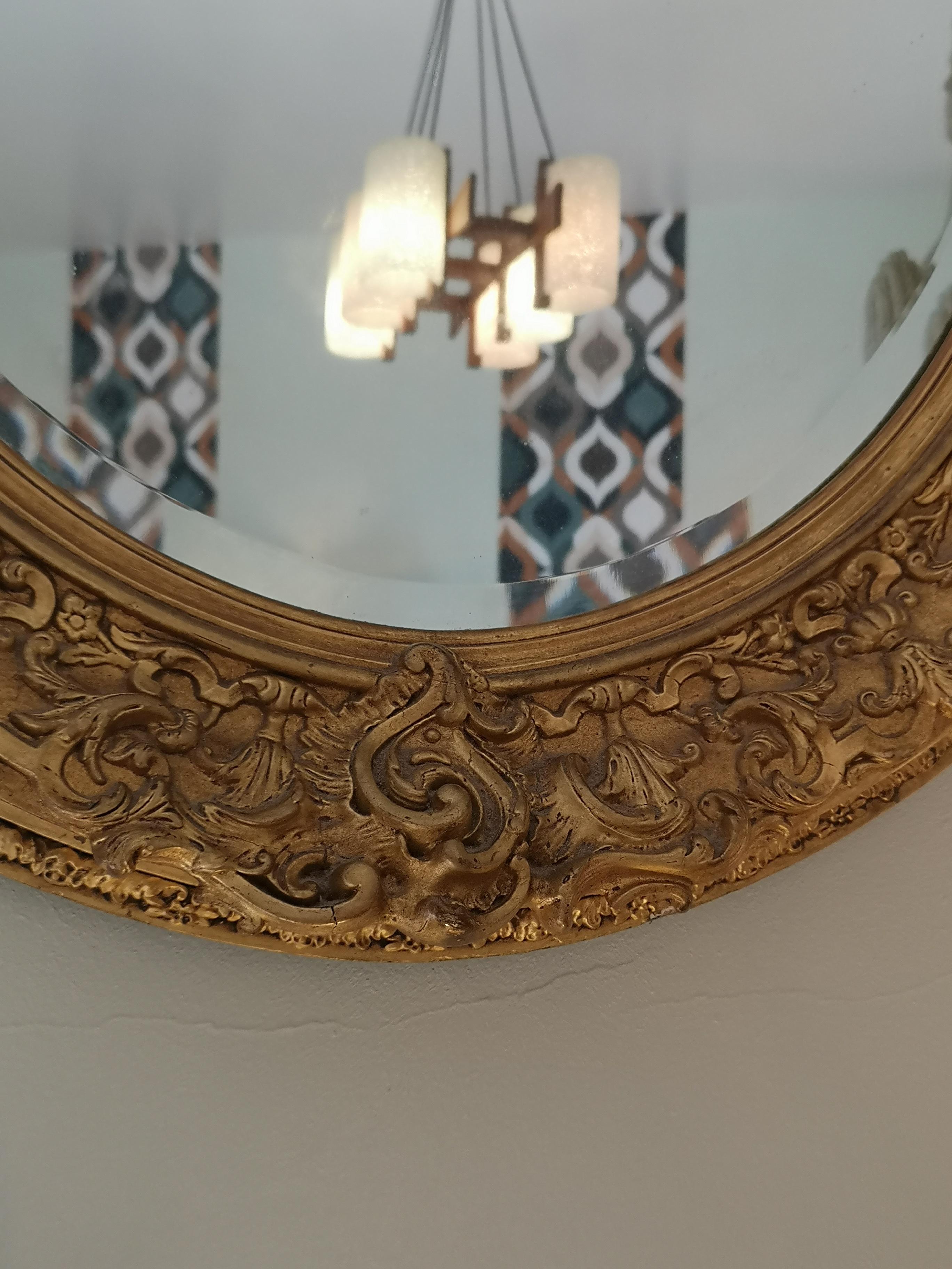 Louis XVI oval mirror in gilded wood and stucco from the 19th century In Fair Condition For Sale In TARBES, FR
