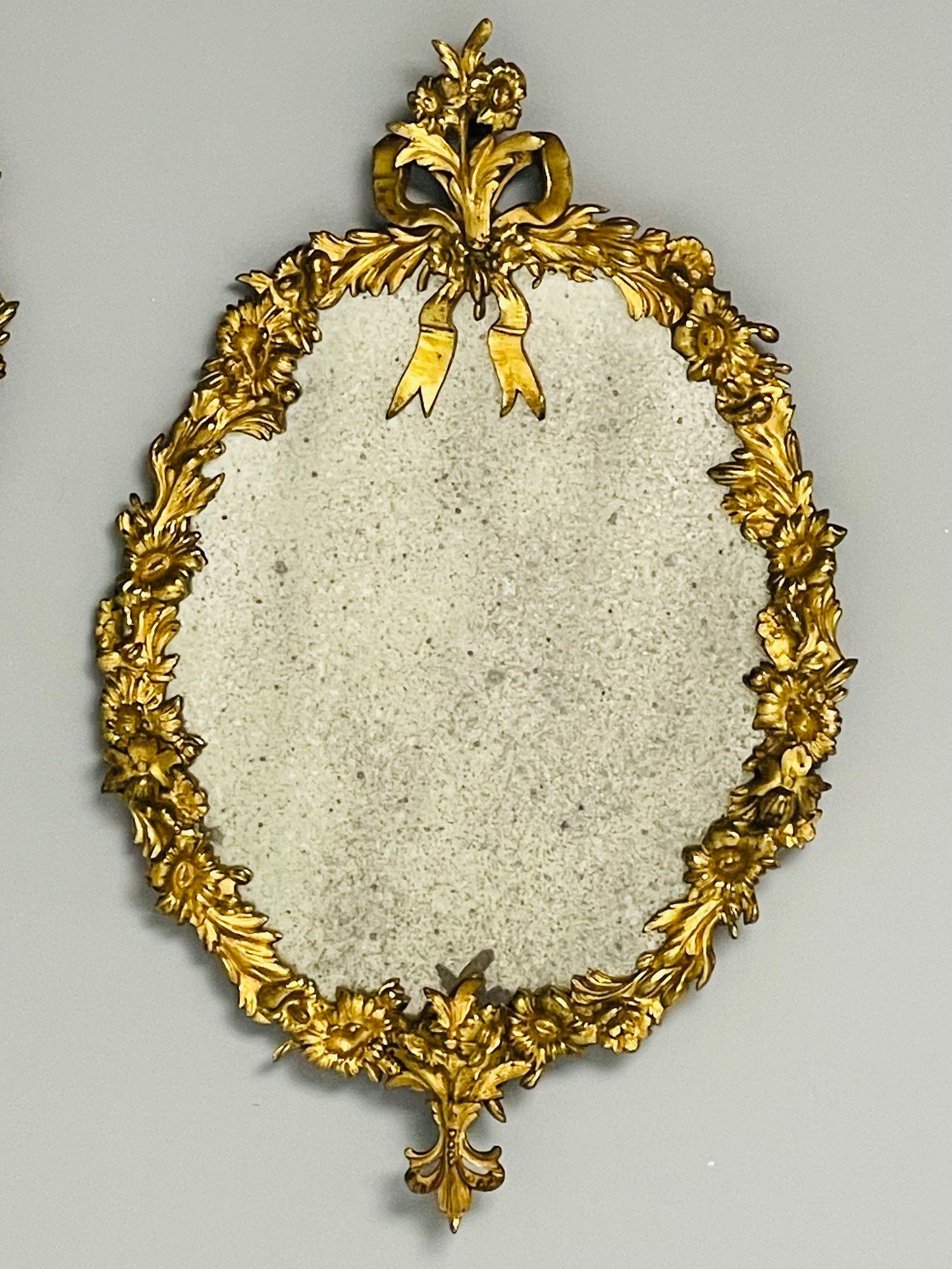 Français Louis XVI, miroirs muraux ovales, motifs floraux, bronze, bois sculpté, France, C.I.C. en vente