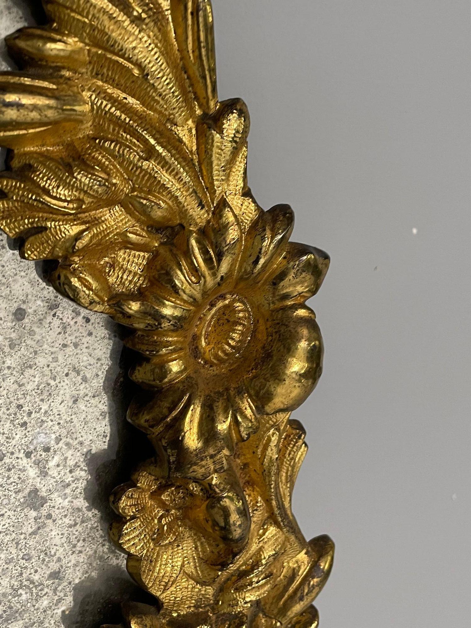 Début du 20ème siècle Louis XVI, miroirs muraux ovales, motifs floraux, bronze, bois sculpté, France, C.I.C. en vente