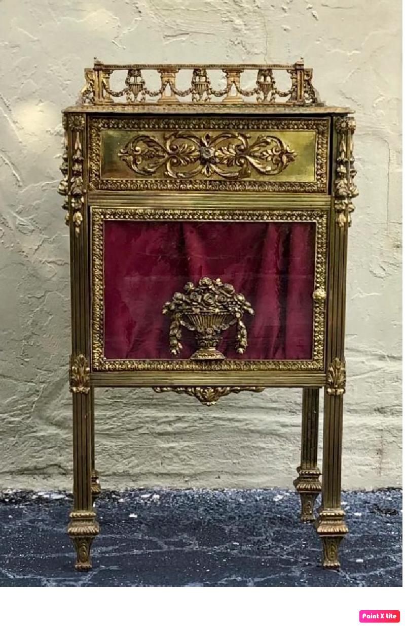 20th century pair of bronze nightstands with glass top and glass paneled sides.

This early antique Louis XVI style bronze or glass vitrine cabinet or nightstand is simply stunning and constructed of the finest quality. The bronze mounts of fine