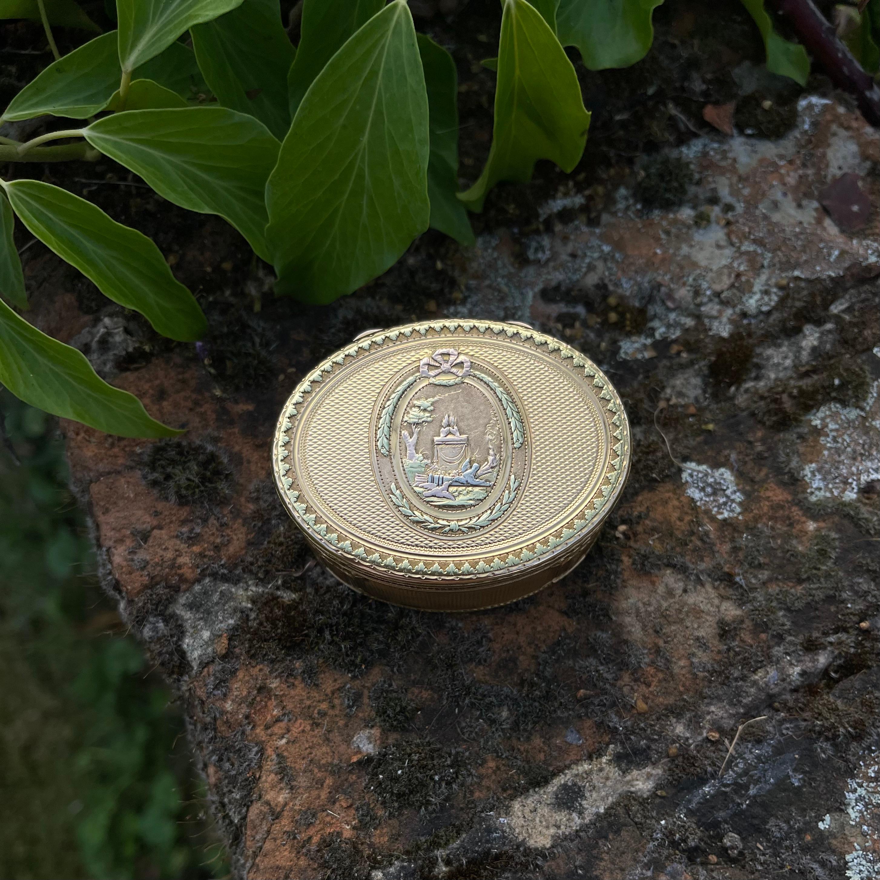 Louis XVI Period Antique 18th Century French vari - coloured 18kt gold oval shaped box. 
Makers Mark: LD 
Made in France, Paris 1773oval-shaped
Fully hallmarked. 

 Amidst the opulence of the Louis XVI era, French craftsmen showcased their unmatched
