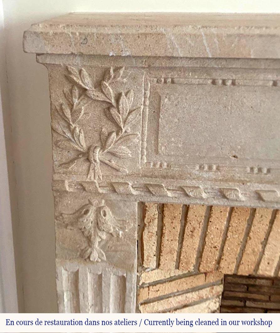 Hand-Carved Louis XVI Period Fireplace in Carved Stone For Sale