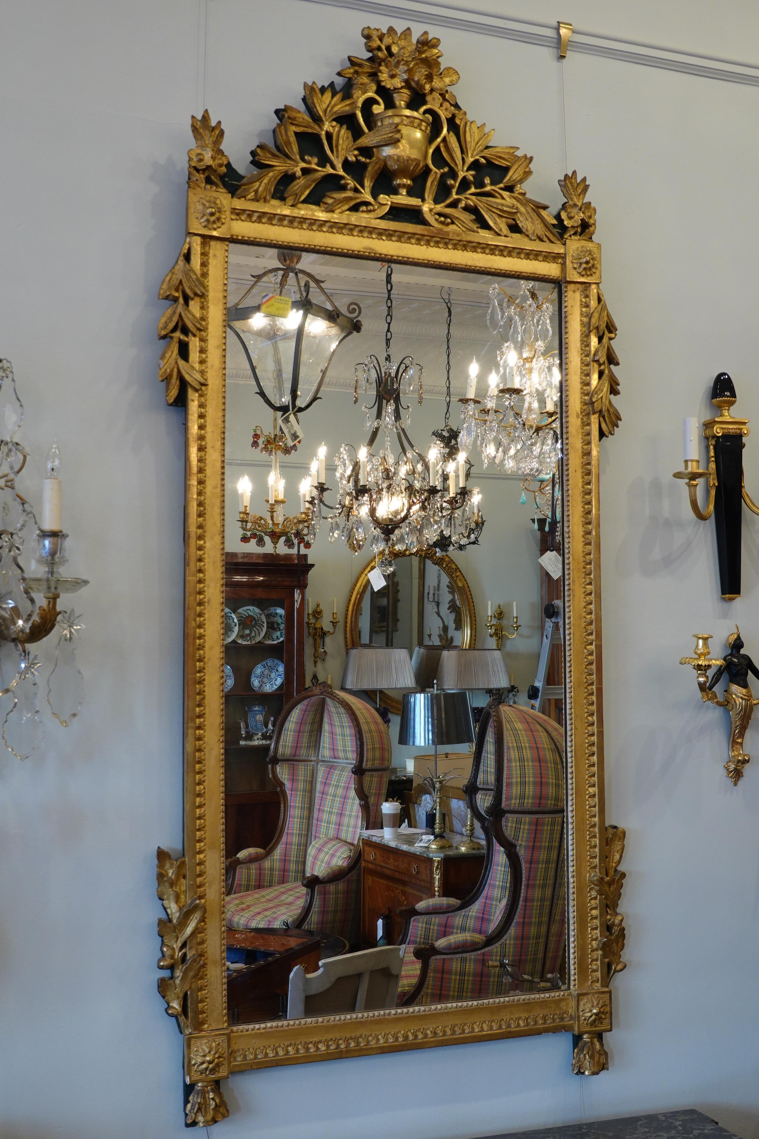French Louis XVI Period Giltwood Trumeau Mirror with Urn, Flowers and Laurel Leaves For Sale