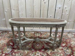 Louis XVI piano bench with caning and painted wood