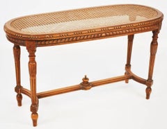 Louis XVI piano bench with caning