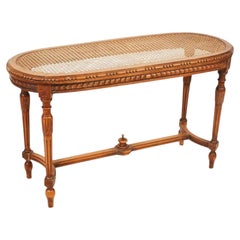 Louis XVI piano bench with caning