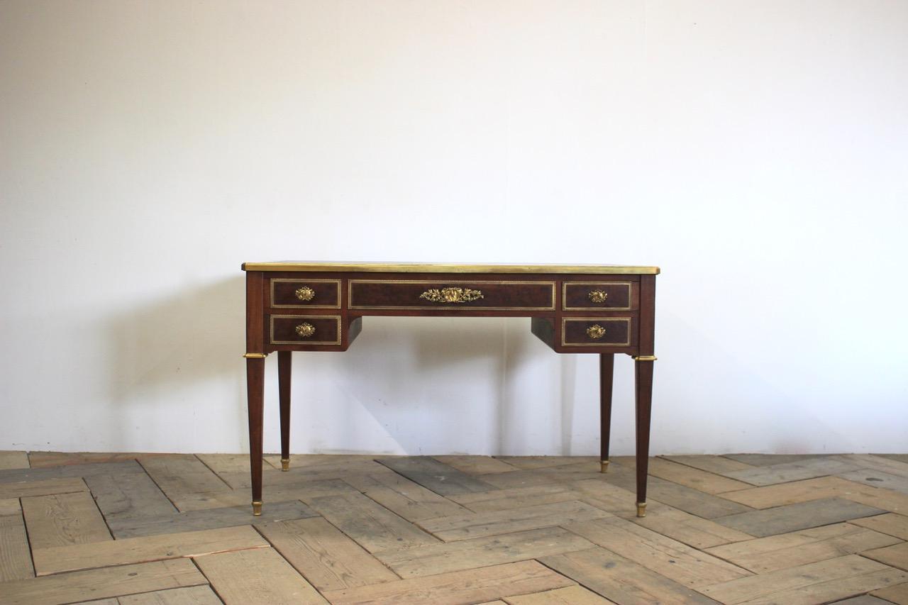 A fine quality, Louis XVI revival plum pudding mahogany desk, with a lovely colour and fine ormolu mounts, stamped underneath G.Durand.
Measurements: 62cm High (floor to seat)
Paris, circa 1900.