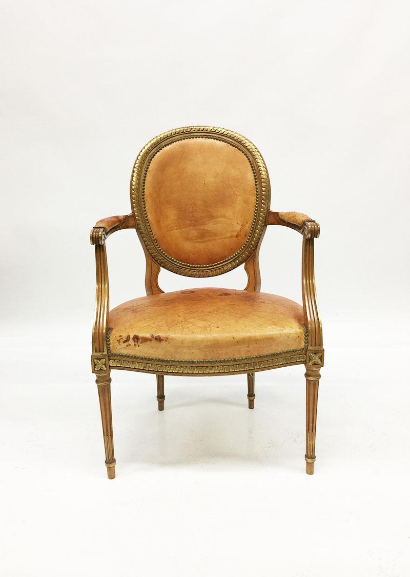 Louis XVI revival style chair by Simon Loscertales Bona

Zaragoza, Spain

Carved walnut wooden chair with details with gilt decoration and brown leather

Original label is shown on the bottom of the chair

1925-1930

Shows some age wear
