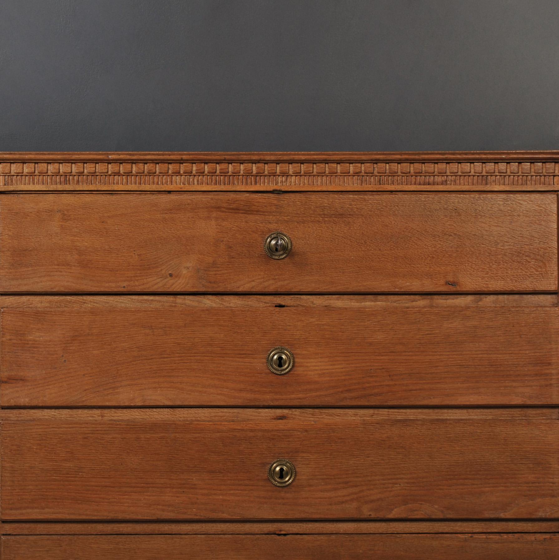 A huge antique Scandinavian oak chest of drawers. W 120, D 59, H 116cm. Dating from the Louis XVI period, circa 1800. A wonderful architectural statement piece of furniture and very practical for storage. Original key which opens each of the large