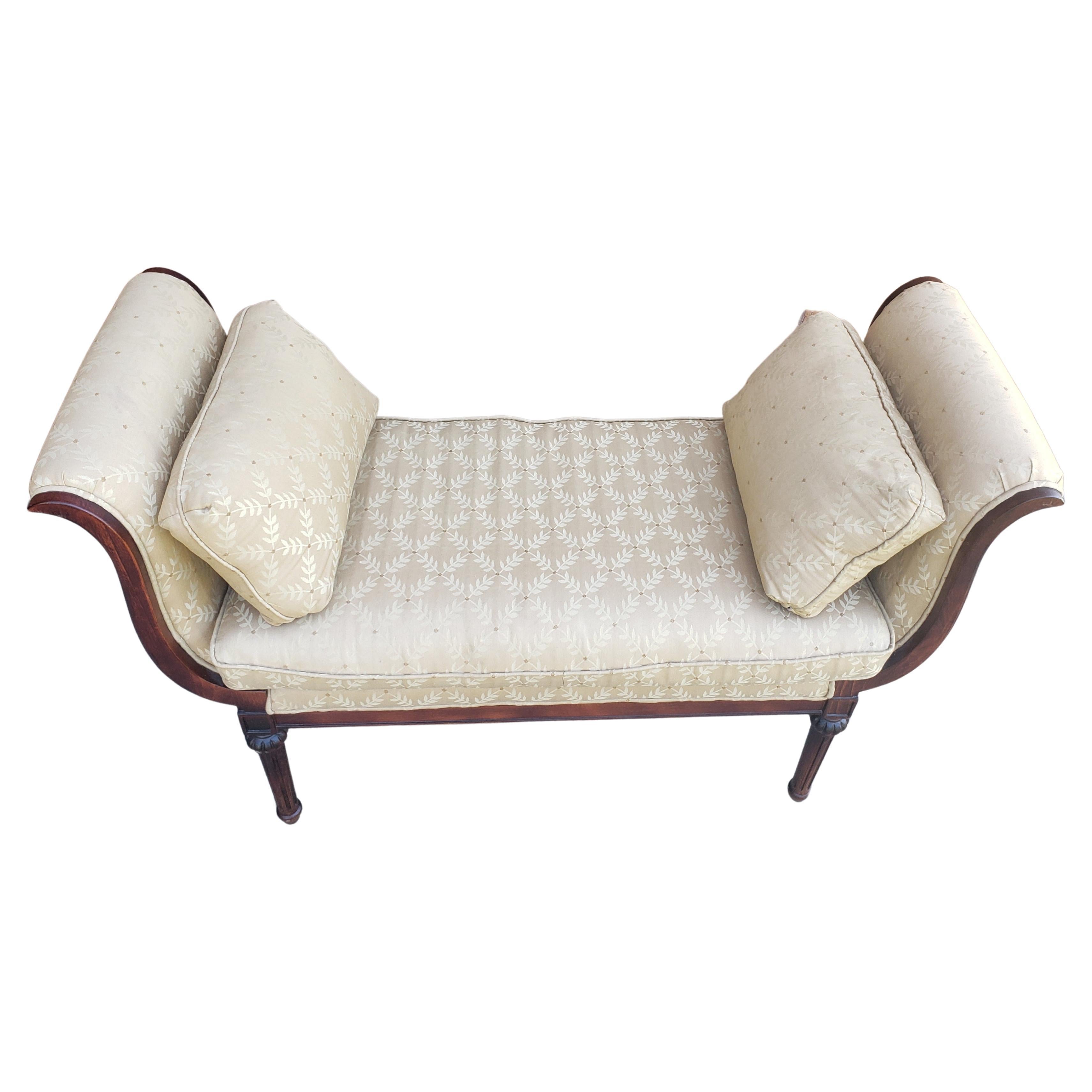 Louis XVI style scroll arms mahogany and upholstered window bench with two pillows.
Measures 51