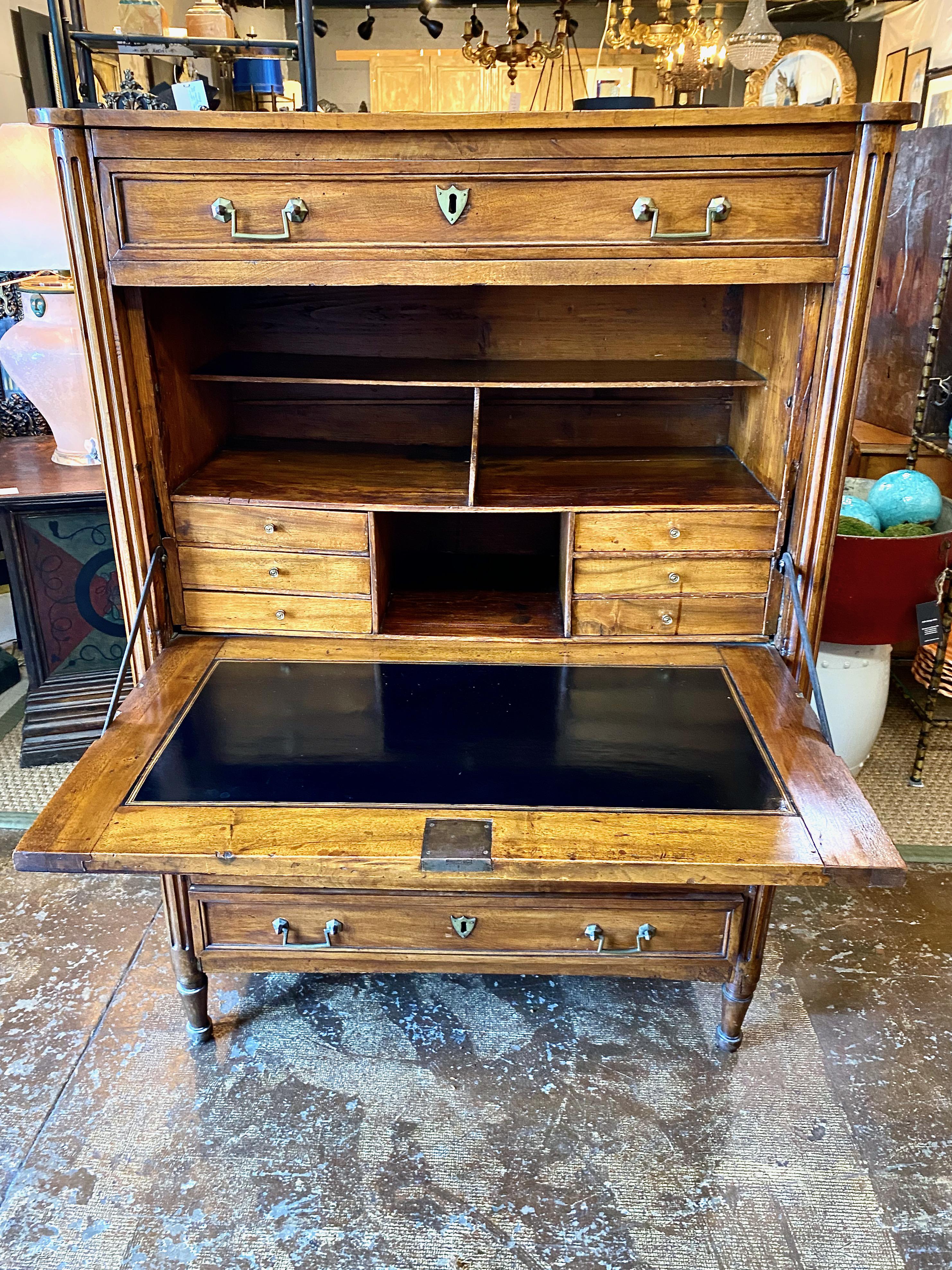 This is a very good example of a late 18th century Louis XVI Secretaire a Abattant. The secretaire is crafted of solid walnut and is a generous 39.5